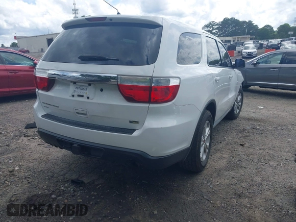 2013 Dodge Durango Special Service z VIN 1C4RDJFG4DC675358, wystawiony jako IAAI lot #42443882 z przebiegiem 94 889 mil mil oraz . Historia ofert i sprzedaży dostępna na DreamBid. Obrazek 4.