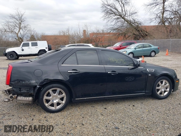 2011 Cadillac STS RWD z VIN 1G6DW6ED8B0159384, wystawiony jako IAAI lot #41840796 z przebiegiem 209 953 mil mil oraz . Historia ofert i sprzedaży dostępna na DreamBid. Obrazek 14.