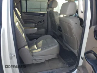 2015 GMC Yukon XL SLT with VIN 1GKS1HKC6FR166415, listed as a Copart auction lot 73029014 with 105,209 mi miles and Salvage Title. Bid and sale history available at carsss.com. Image 11.