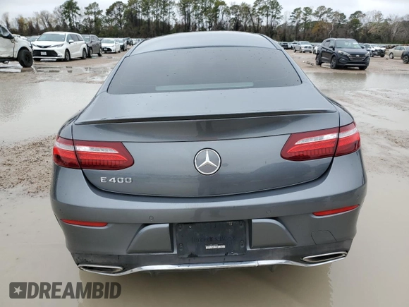 2018 Mercedes-Benz E-Class E 400 with VIN WDD1J6FB9JF039283, listed as a Copart auction lot 82918073 with 73,626 mi miles and Salvage Title. Bid and sale history available at carsss.com. Image 6.
