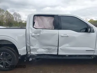 2023 Ford F-150 XL with VIN 1FTFW1ED8PFD06493, listed as a IAAI auction lot 42002427 with 31,147 mi miles and . Bid and sale history available at carsss.com. Image 6.
