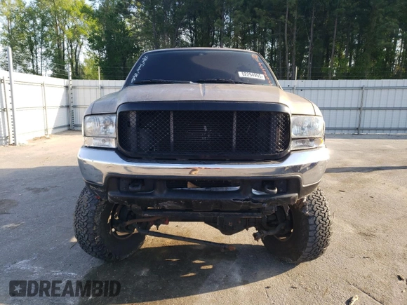 1999 Ford F-250 XL with VIN 1FTNX21F0XEE70963, listed as a Copart auction lot 52294955 with 218,969 mi miles and Salvage title. Bid and sale history available at DreamBid. Image 5.