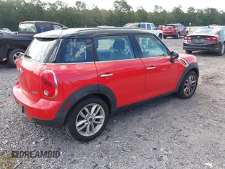 2012 MINI Countryman with VIN WMWZB3C57CWM06379, listed as a IAAI auction lot 42467193 with 100,485 mi miles and . Bid and sale history available at DreamBid. Image 4.