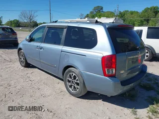 2014 Kia Sedona EX with VIN KNDMH4C70E6553732, listed as a IAAI auction lot 41812283 with 676,894 mi miles. Bid and sale history available at carsss.com. Image 3.