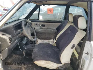1984 Volkswagen Rabbit z VIN WVWCA0151EK009645, wystawiony jako Copart lot #78178084 z przebiegiem Nie podano mil oraz Tytuł czysty. Historia ofert i sprzedaży dostępna na DreamBid. Obrazek 7.