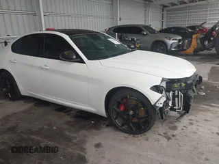 2019 Alfa Romeo Giulia with VIN ZARFAMAN6K7619579, listed as a IAAI auction lot 42646148 with 74,049 mi miles and . Bid and sale history available at DreamBid. Image 1.