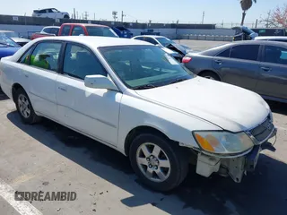 2001 Toyota Avalon XL z VIN 4T1BF28B51U139054, wystawiony jako IAAI lot #42223994 z przebiegiem 250 902 mil mil oraz . Historia ofert i sprzedaży dostępna na DreamBid. Obrazek 3.