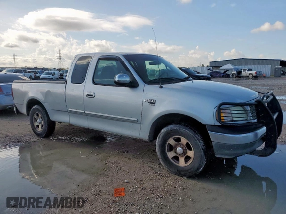 2000 Ford F-150 XL с VIN 1FTRX17L6YKB45245, выставлен на аукционе Copart как лот 62365195 с пробегом 306 210 миль миль и Списание • Salvage title. История ставок и продаж доступна на DreamBid. Изображение 4.