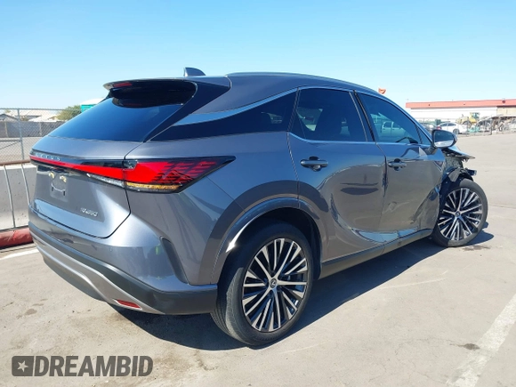 2023 Lexus RX with VIN 2T2BAMBA1PC015931, listed as a IAAI auction lot 41611538 with 17,240 mi miles. Bid and sale history available at carsss.com. Image 4.