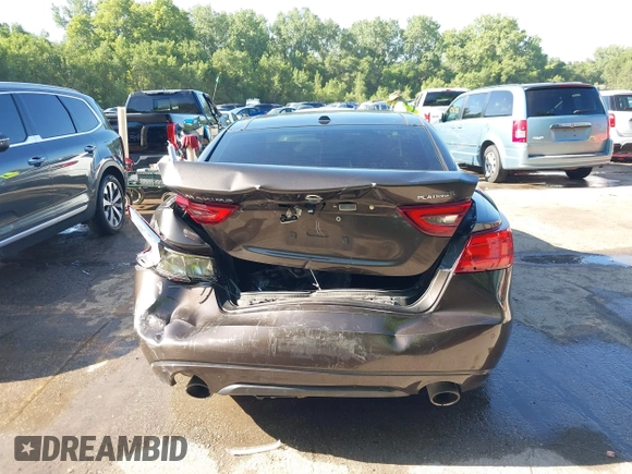 2016 Nissan Maxima Platinum z VIN 1N4AA6AP3GC385276, wystawiony jako IAAI lot #42547410 z przebiegiem 100 307 mil mil oraz . Historia ofert i sprzedaży dostępna na DreamBid. Obrazek 6.