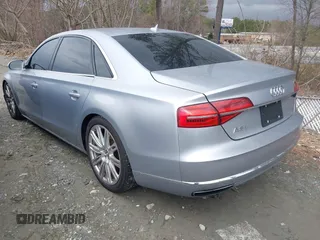 2015 Audi A8 L 4.0T with VIN WAU32AFD7FN021203, listed as a IAAI auction lot 41736045 with 135,471 mi miles. Bid and sale history available at carsss.com. Image 3.