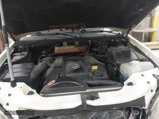 2000 Mercedes-Benz M-Class with VIN 4JGAB54E2YA166846, listed as a IAAI auction lot 41744657 with 226,711 mi miles. Bid and sale history available at carsss.com. Image 10.