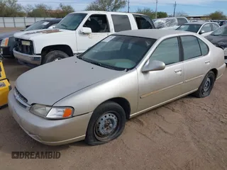 1998 Nissan Altima XE with VIN 1N4DL01DXWC253625, listed as a IAAI auction lot 41517801 with 194,609 mi miles. Bid and sale history available at carsss.com. Image 2.