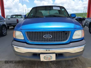1999 Ford F-150 XL with VIN 1FTRX17L9XNB83680, listed as a IAAI auction lot 42636807 with Not provided miles and . Bid and sale history available at DreamBid. Image 6.