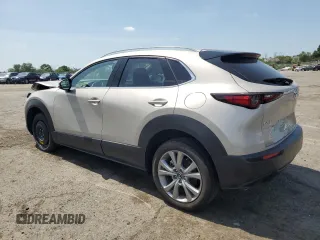 2023 Mazda CX-30 S Premium z VIN 3MVDMBDM2PM518678, wystawiony jako Copart lot #61439255 z przebiegiem 27 938 mil mil oraz Szkoda całkowita • Salvage title. Historia ofert i sprzedaży dostępna na DreamBid. Obrazek 2.