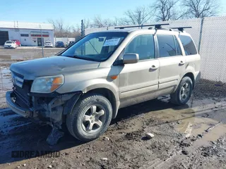 2007 Honda Pilot EX with VIN 2HKYF184X7H534943, listed as a IAAI auction lot 41818741 with 220,151 mi miles. Bid and sale history available at carsss.com. Image 2.