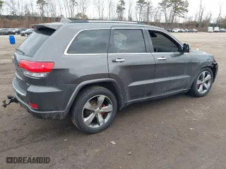 2014 Jeep Grand Cherokee Overland with VIN 1C4RJFCGXEC172008, listed as a IAAI auction lot 41719313 with 164,682 mi miles. Bid and sale history available at carsss.com. Image 4.