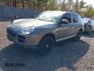 2004 Porsche Cayenne S with VIN WP1AB29P74LA71547, listed as a IAAI auction lot 41751311 with 191,264 mi miles. Bid and sale history available at carsss.com. Image 2.