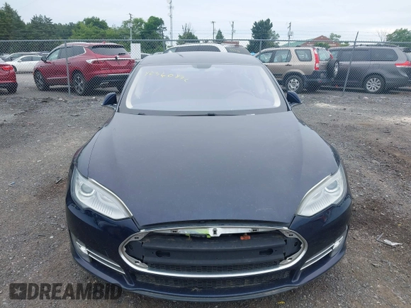 2014 Tesla Model S 60 with VIN 5YJSA1H19EFP32063, listed as a IAAI auction lot 42360872 with 103,495 mi miles and . Bid and sale history available at DreamBid. Image 12.