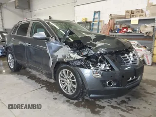 2013 Cadillac SRX Performance Collection with VIN 3GYFNHE37DS530908, listed as a IAAI auction lot 41662796 with 80,254 mi miles. Bid and sale history available at carsss.com. Image 1.
