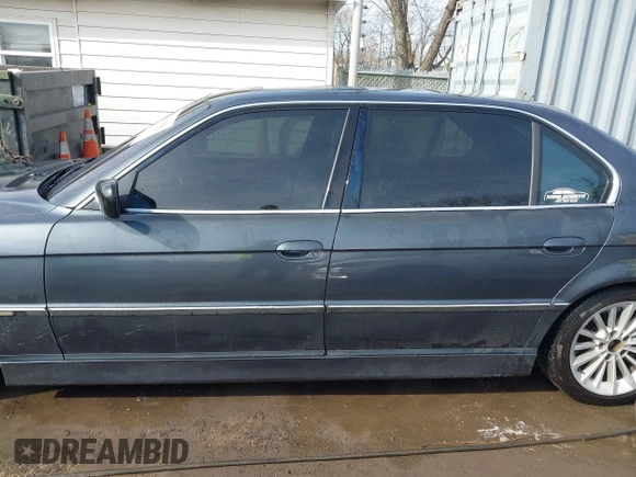 2001 BMW 7 Series 740iL with VIN WBAGH83491DP28749, listed as a IAAI auction lot 41440556 with 198,734 mi miles. Bid and sale history available at carsss.com. Image 14.