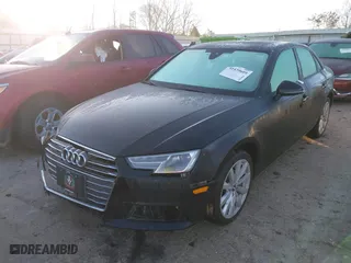 2017 Audi A4 Premium with VIN WAUANAF47HN039038, listed as a IAAI auction lot 41439609 with 121,410 mi miles. Bid and sale history available at carsss.com. Image 2.