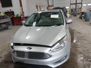 2018 Ford Focus Titanium with VIN 1FADP3N25JL261736, listed as a IAAI auction lot 41032128 with 59,142 mi miles and . Bid and sale history available at DreamBid. Image 12.
