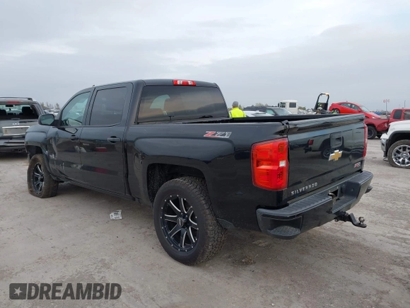2017 Chevrolet Silverado 1500 LT with VIN 1GCUKREC2HF208232, listed as a IAAI auction lot 40933445 with 105,928 mi miles and . Bid and sale history available at DreamBid. Image 3.