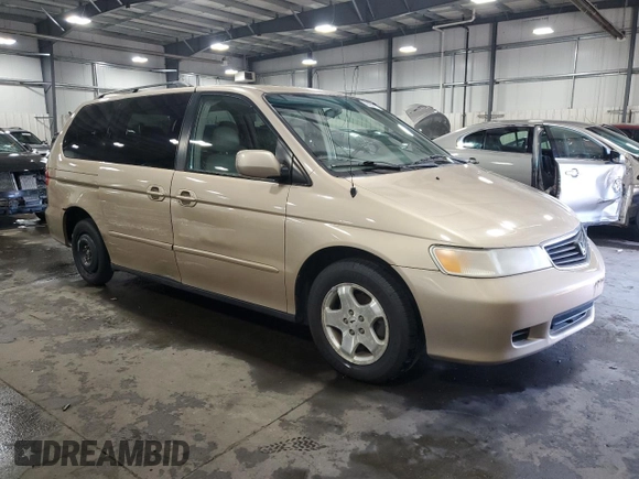 2000 Honda Odyssey EX with VIN 2HKRL1875YH611548, listed as a Copart auction lot 56593275 with 191,533 mi miles and Salvage title. Bid and sale history available at DreamBid. Image 4.