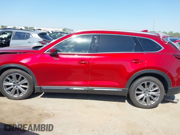 2021 Mazda CX-9 Signature with VIN JM3TCBEY9M0500122, listed as a IAAI auction lot 42252561 with 46,154 mi miles and . Bid and sale history available at DreamBid. Image 14.
