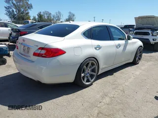 2013 Infiniti M with VIN JN1BY1AP6DM511104, listed as a IAAI auction lot 41818184 with 138,605 mi miles and . Bid and sale history available at DreamBid. Image 4.