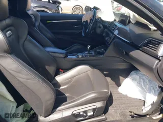 2016 BMW M4 with VIN WBS3R9C51GK708621, listed as a IAAI auction lot 41678133 with 59,501 mi miles. Bid and sale history available at carsss.com. Image 5.