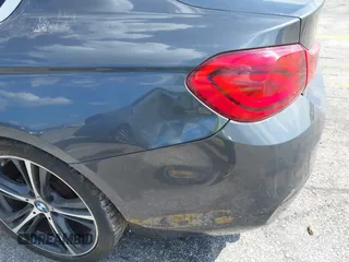 2018 BMW 4 Series 430i with VIN WBA4W3C57JAC97210, listed as a IAAI auction lot 41943772 with 89,232 mi miles and . Bid and sale history available at DreamBid. Image 16.
