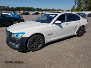 2014 BMW 7 Series 740i with VIN WBAYA6C56ED144241, listed as a Copart auction lot 77440584 with 135,305 mi miles and Salvage Title. Bid and sale history available at carsss.com. Image 1.