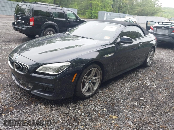 2017 BMW 6 Series 650i xDrive z VIN WBA6F7C52HD930816, wystawiony jako IAAI lot #42168478 z przebiegiem 89 191 mil mil oraz . Historia ofert i sprzedaży dostępna na DreamBid. Obrazek 17.