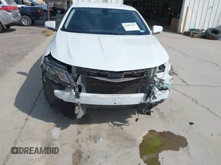 2017 Chevrolet Impala LT with VIN 2G1105S39H9164236, listed as a IAAI auction lot 42001427 with 150,937 mi miles and . Bid and sale history available at DreamBid. Image 5.