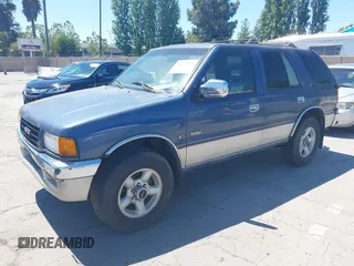 1996 Isuzu Rodeo z VIN 4S2CM58V6T4310394, wystawiony jako IAAI lot #42215009 z przebiegiem 244 151 mil mil oraz . Historia ofert i sprzedaży dostępna na DreamBid. Obrazek 2.