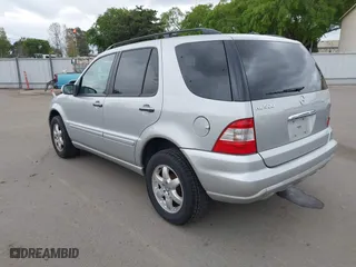 2003 Mercedes-Benz M-Class with VIN 4JGAB75E33A378920, listed as a IAAI auction lot 41914065 with 232,968 mi miles. Bid and sale history available at carsss.com. Image 3.