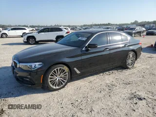 2018 BMW 5 Series 530i with VIN WBAJA5C54JG899845, listed as a Copart auction lot 76386124 with 57,379 mi miles and Salvage Title. Bid and sale history available at DreamBid. Image 1.