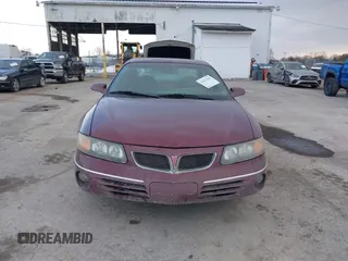 2001 Pontiac Bonneville SE z VIN 1G2HX54K914293726, wystawiony jako IAAI lot #41373612 z przebiegiem 120 117 mil mil oraz . Historia ofert i sprzedaży dostępna na DreamBid. Obrazek 12.