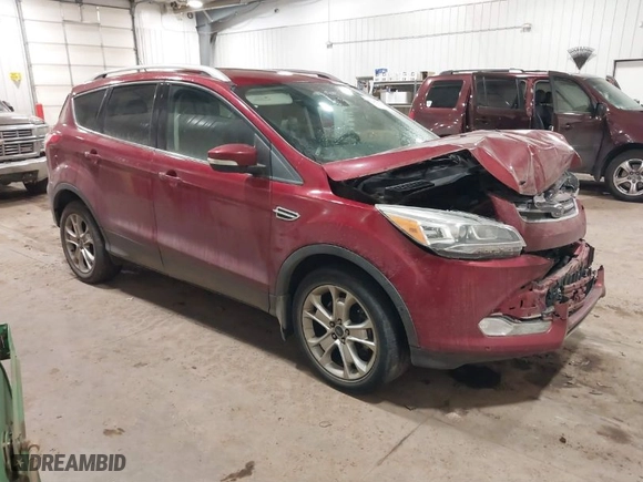 2014 Ford Escape Titanium with VIN 1FMCU9JX0EUC76045, listed as a IAAI auction lot 41119637 with 105,000 mi miles. Bid and sale history available at carsss.com. Image 1.