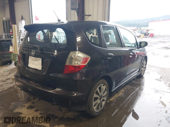 2013 Honda Fit Sport with VIN JHMGE8H59DC012780, listed as a IAAI auction lot 41929195 with 135,959 mi miles. Bid and sale history available at carsss.com. Image 4.