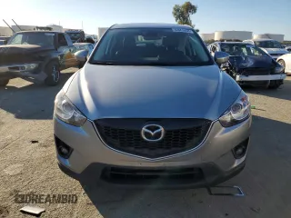 2014 Mazda CX-5 Grand Touring with VIN JM3KE2DY8E0412025, listed as a Copart auction lot 42863655 with 72,416 mi miles and Salvage Title. Bid and sale history available at carsss.com. Image 5.