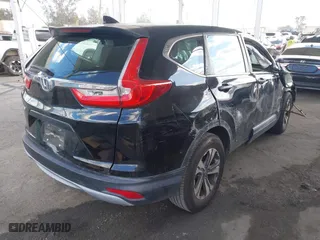 2019 Honda CR-V LX with VIN 2HKRW5H33KH406779, listed as a IAAI auction lot 41953202 with 73,039 mi miles. Bid and sale history available at carsss.com. Image 4.