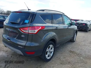 2016 Ford Escape SE z VIN 1FMCU9G92GUC37694, wystawiony jako IAAI lot #41917697 z przebiegiem 78 511 mil mil oraz . Historia ofert i sprzedaży dostępna na DreamBid. Obrazek 4.