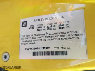 2004 Pontiac GTO with VIN 6G2VX12G54L245972, listed as a IAAI auction lot 41819699 with 77,198 mi miles. Bid and sale history available at carsss.com. Image 9.