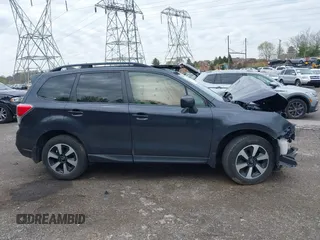 2018 Subaru Forester Premium with VIN JF2SJAEC7JH574341, listed as a IAAI auction lot 42021599 with 58,000 mi miles and . Bid and sale history available at DreamBid. Image 14.