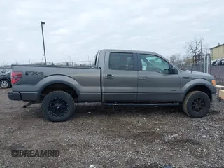 2011 Ford F-150 XLT with VIN 1FTFW1ET4BFC23725, listed as a IAAI auction lot 42018932 with 323,160 mi miles. Bid and sale history available at carsss.com. Image 14.