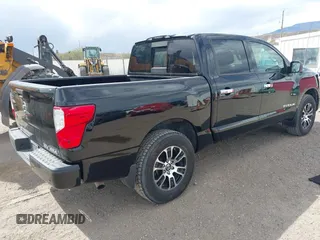 2021 Nissan Titan SL z VIN 1N6AA1ED9MN509741, wystawiony jako IAAI lot #42062139 z przebiegiem 41 291 mil mil oraz . Historia ofert i sprzedaży dostępna na DreamBid. Obrazek 4.