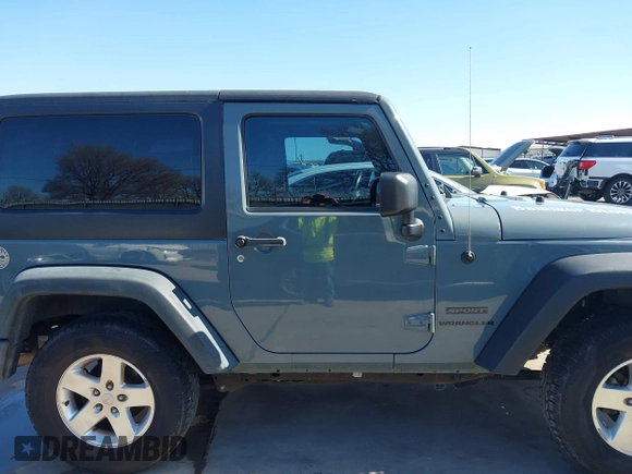 2014 Jeep Wrangler Sport with VIN 1C4AJWAGXEL177449, listed as a IAAI auction lot 41741519 with 117,056 mi miles and . Bid and sale history available at carsss.com. Image 13.